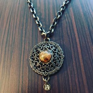 DeMarcus Alexan Brass Embellished Restin Necklace